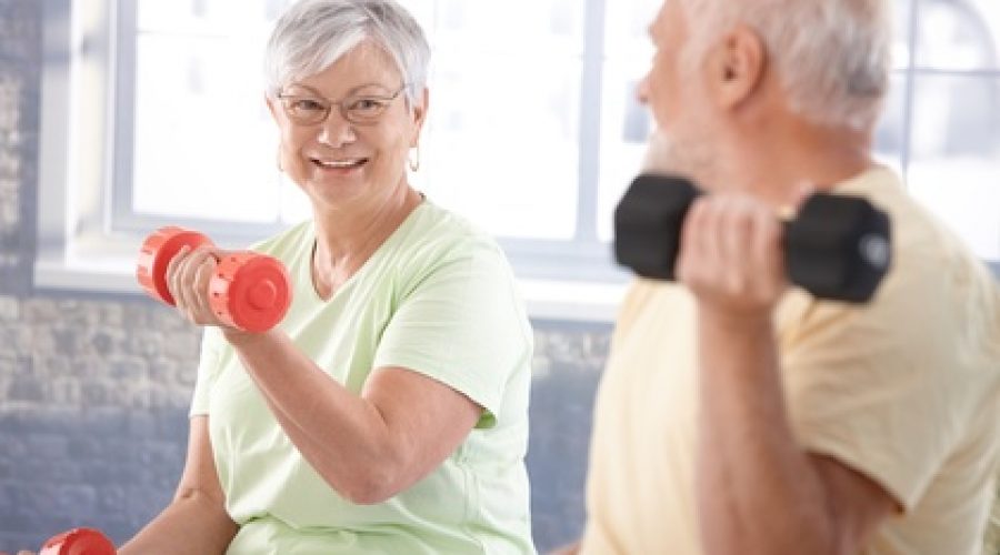 Vital senior couple in the gym